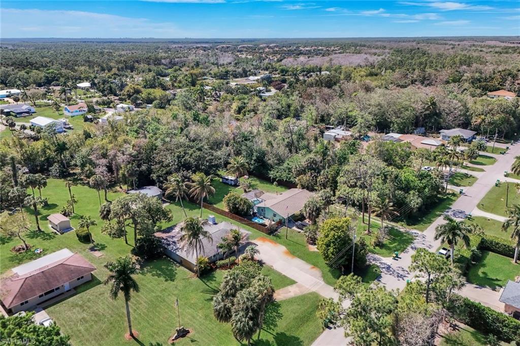 5290 Cypress Lane Naples, FL 34113 - Photo 31 of 35 an aerial view of multiple house