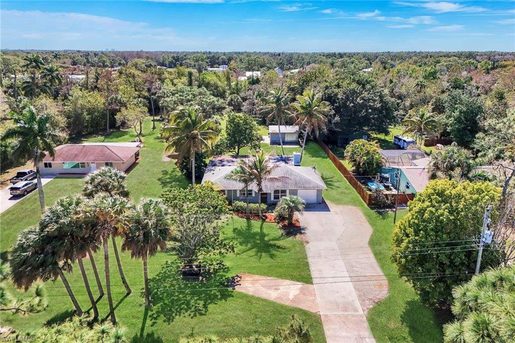 5290 Cypress Lane Naples, FL 34113 - Photo 32 of 35 an aerial view of multiple house