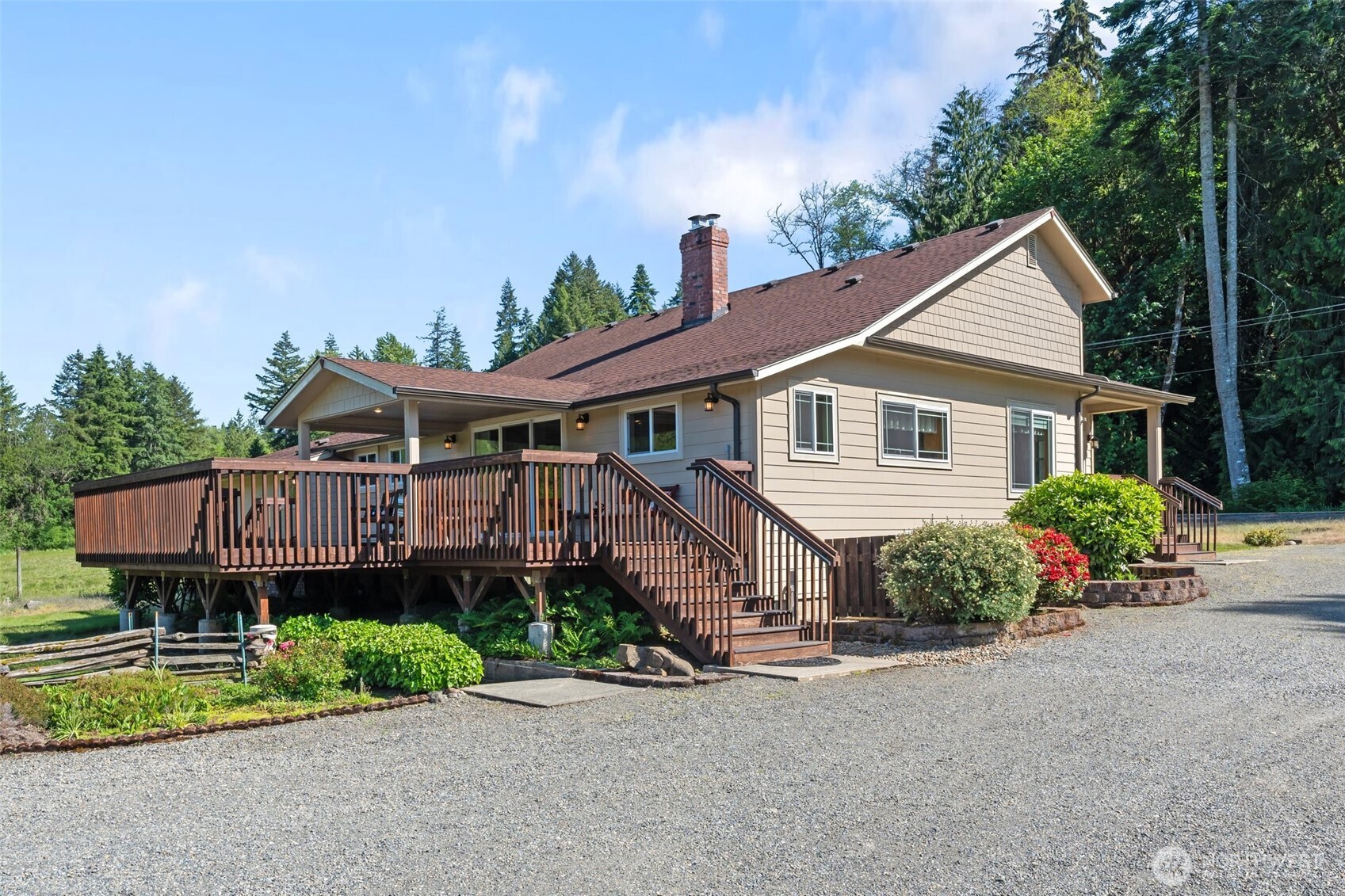 735 Coal Creek Road Chehalis, WA 98532 - Photo 1 of 39 a aerial view of a house with a yard and potted plants