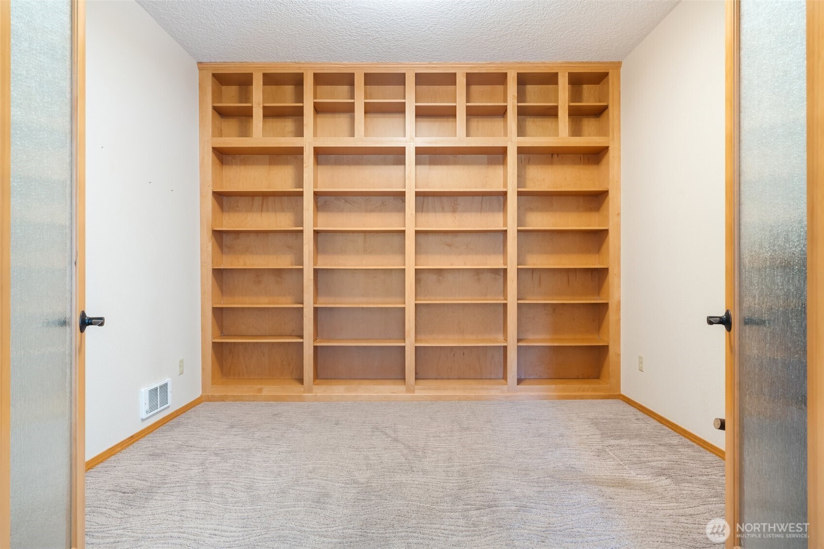 735 Coal Creek Road Chehalis, WA 98532 - Photo 12 of 39 a view of an empty room with empty shelves
