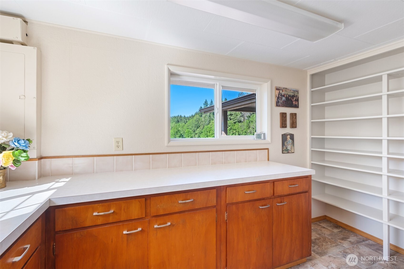 735 Coal Creek Road Chehalis, WA 98532 - Photo 19 of 39 a kitchen with a cabinets and a potted plant