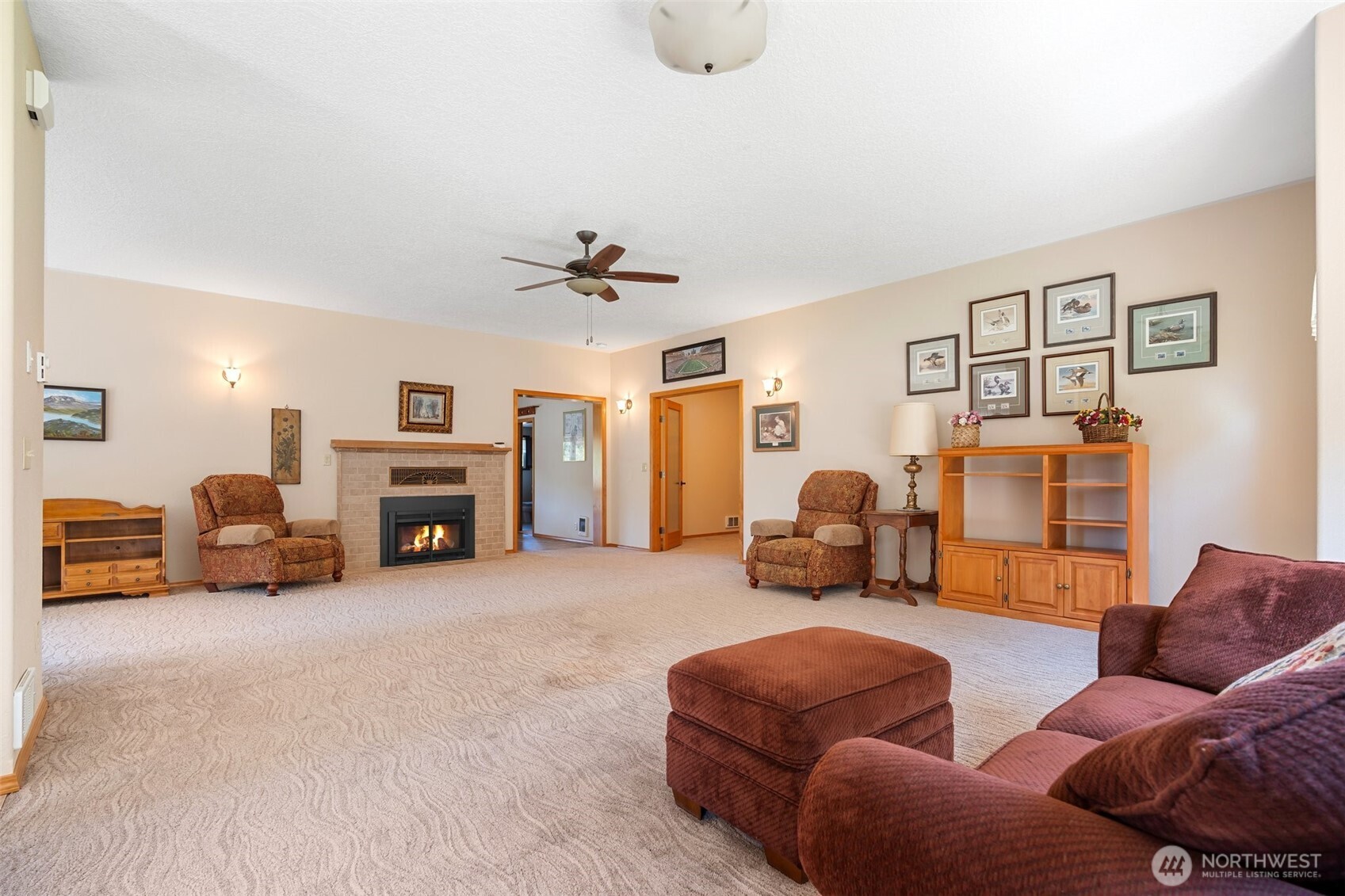 735 Coal Creek Road Chehalis, WA 98532 - Photo 6 of 39 a bedroom with furniture and a fireplace