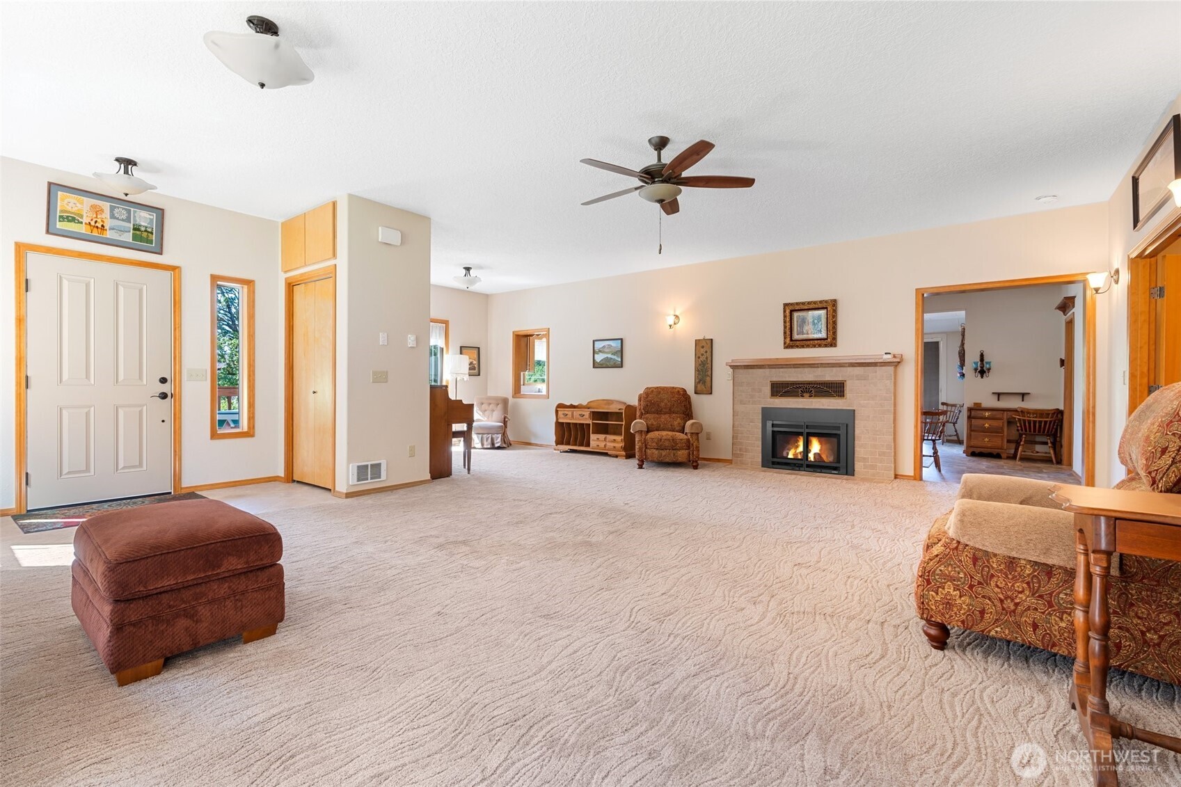 735 Coal Creek Road Chehalis, WA 98532 - Photo 7 of 39 a living room with furniture and a fireplace
