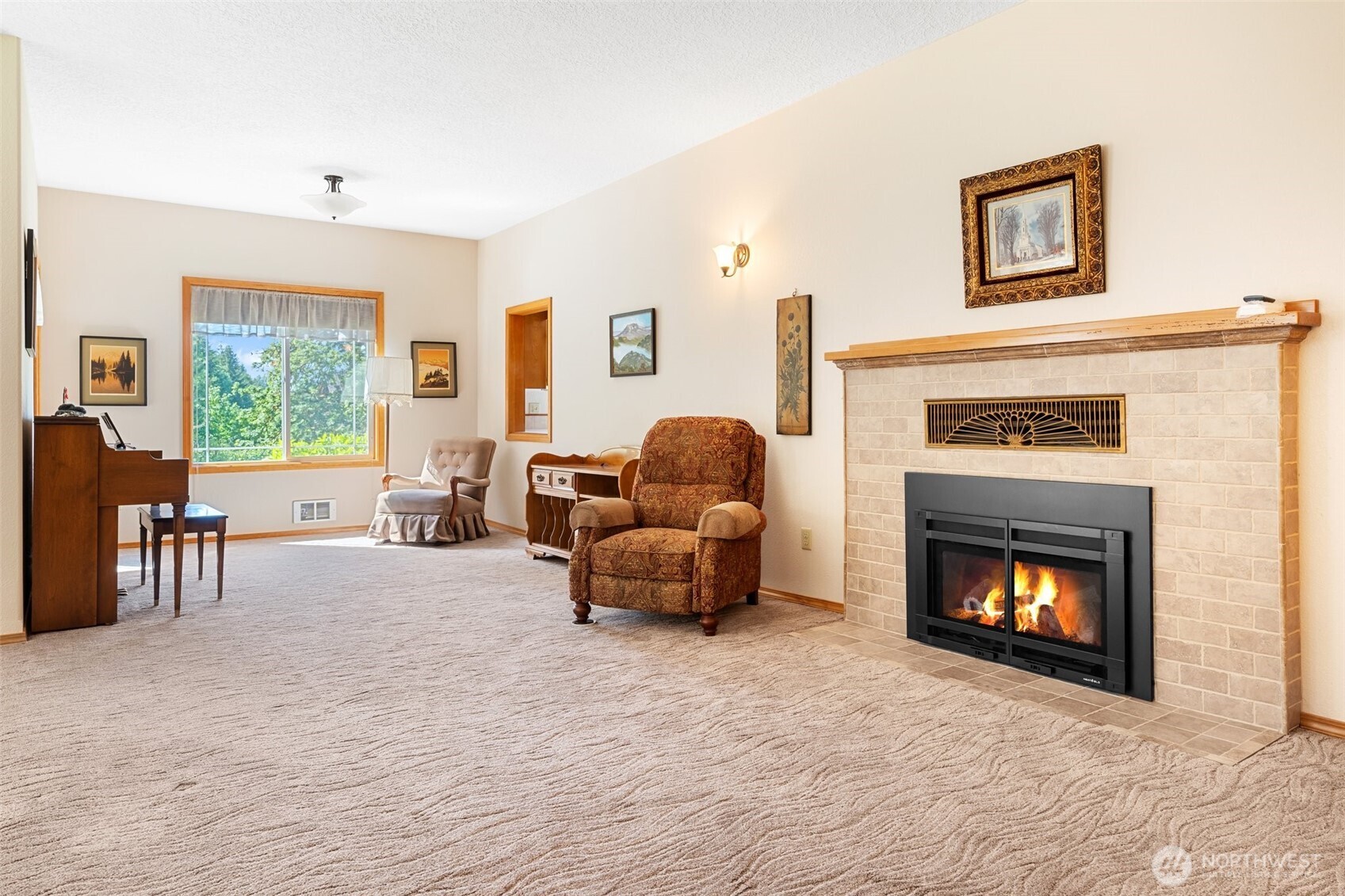 735 Coal Creek Road Chehalis, WA 98532 - Photo 8 of 39 a living room with furniture and a fireplace