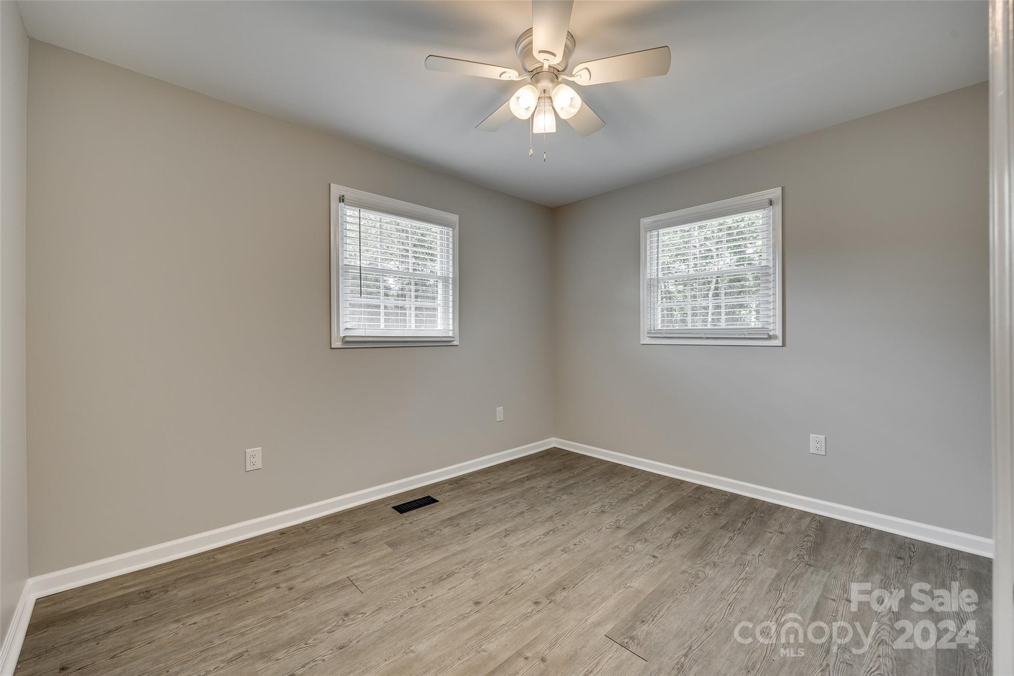 493 South Beersheba Road Clover, SC 29710 - Photo 14 of 25 wooden floor in an empty room with a window