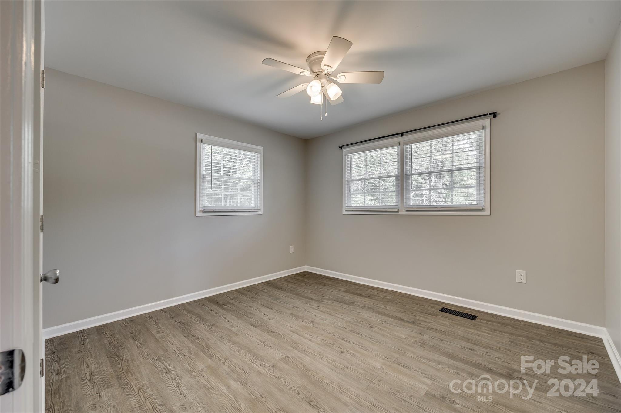 493 South Beersheba Road Clover, SC 29710 - Photo 18 of 25 wooden floor in an empty room with a window