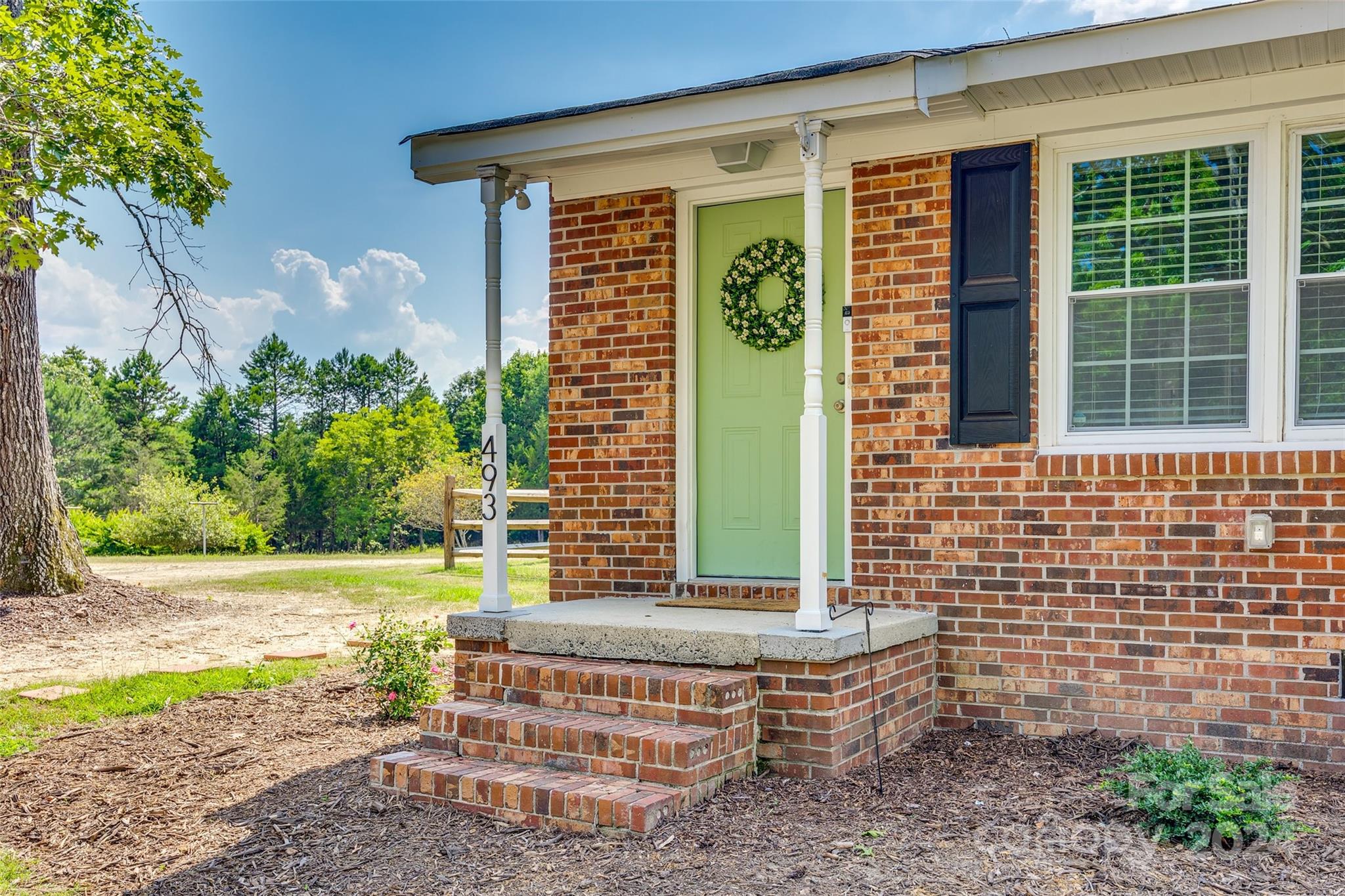 493 South Beersheba Road Clover, SC 29710 - Photo 2 of 25 a front view of a house with a yard