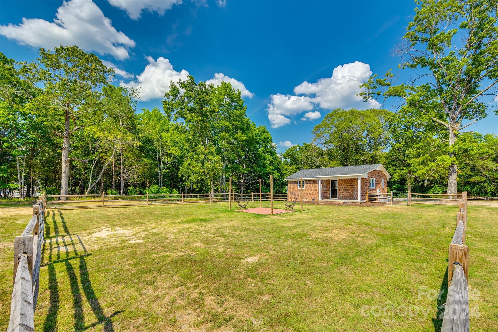 493 South Beersheba Road Clover, SC 29710 - Photo 22 of 25 a view of a swimming pool with an outdoor space