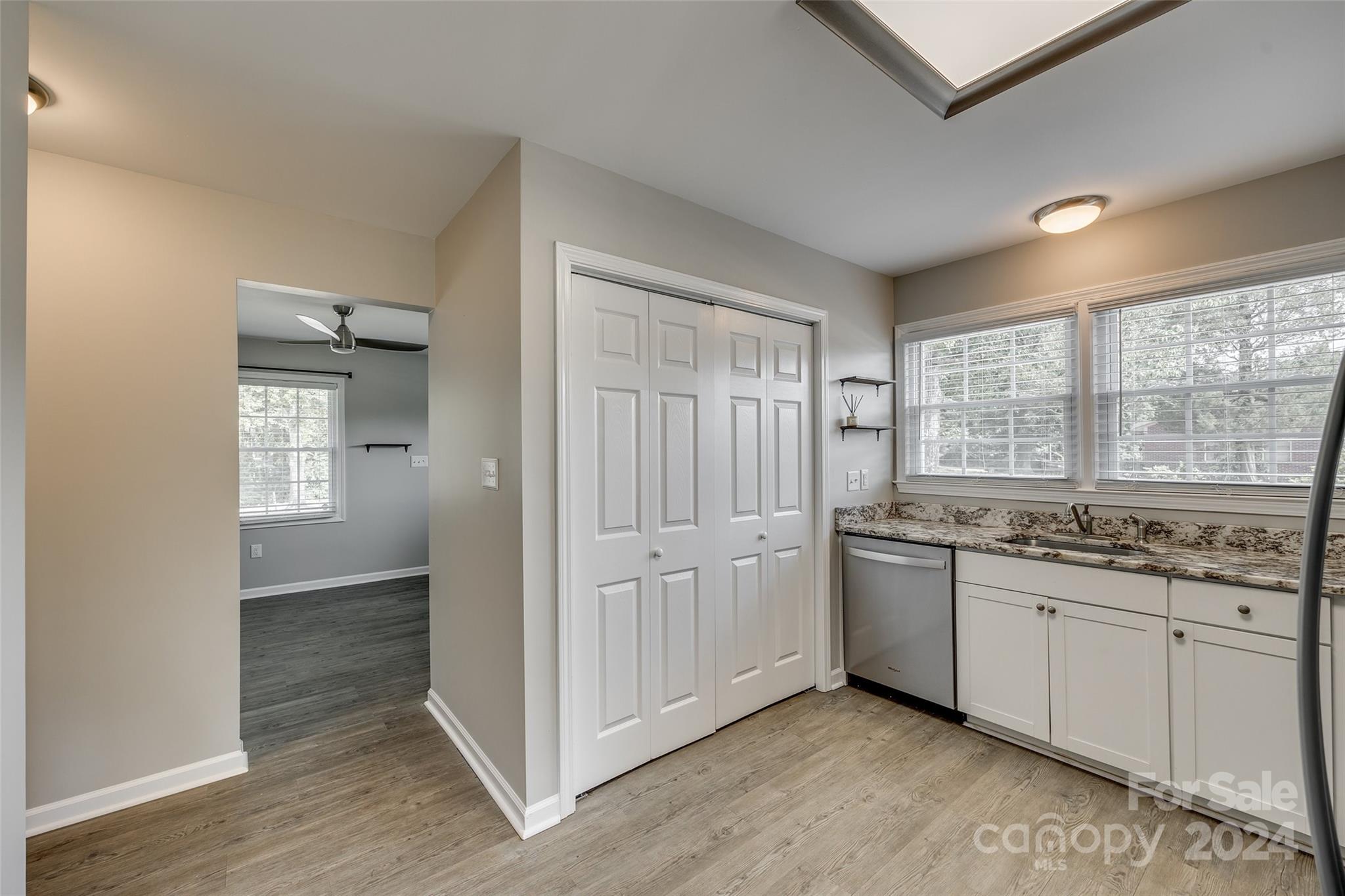 493 South Beersheba Road Clover, SC 29710 - Photo 5 of 25 a room with granite countertop a sink and a stove top oven