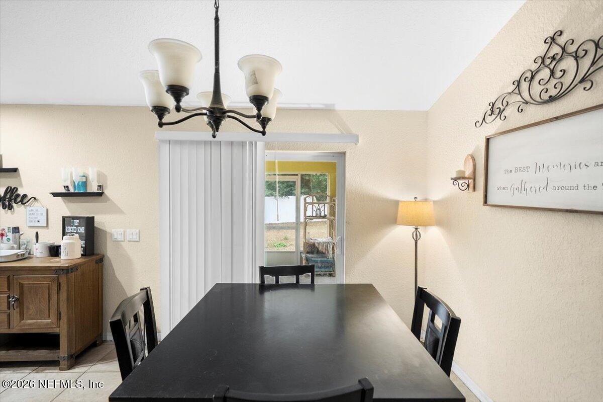 18 Pine Track Terrace Ocala, FL 34472 - Photo 11 of 23 a view of a hallway with furniture and wooden floor