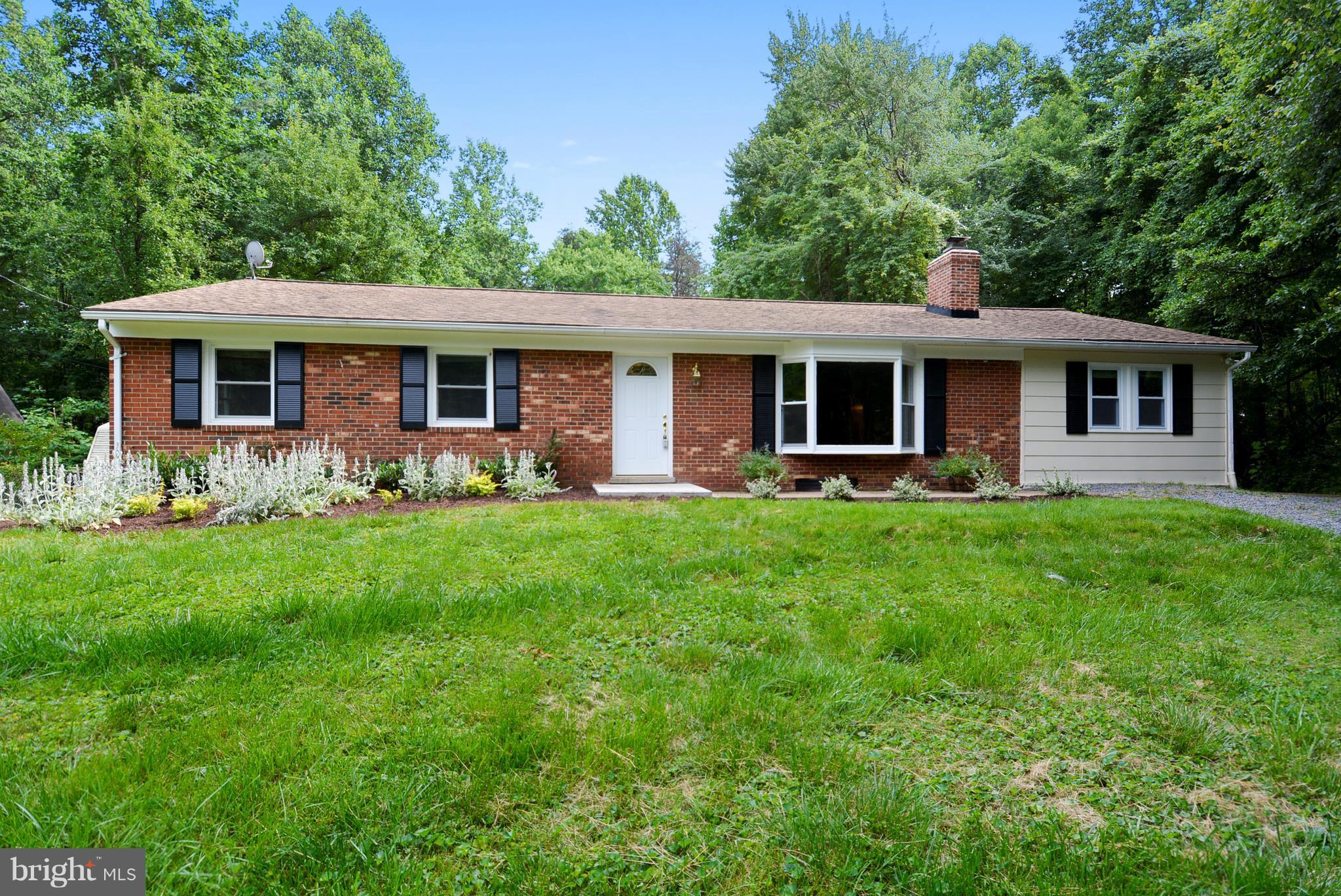 7301 Token Valley Road Manassas, VA 20112 - Photo 1 of 29 Brick Rambler w/ Living Space Addition