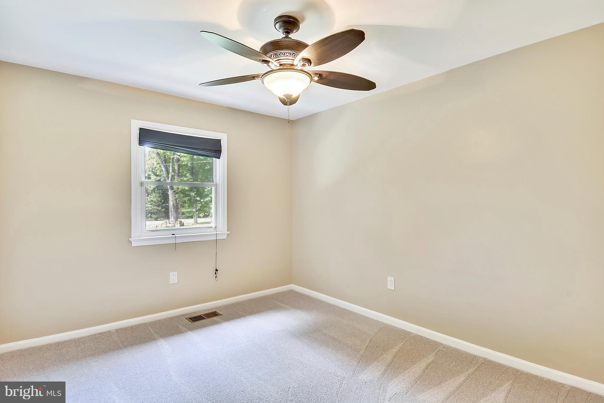 7301 Token Valley Road Manassas, VA 20112 - Photo 19 of 29 Bedroom 3 w/ Lighted Ceiling Fan & New Carpet