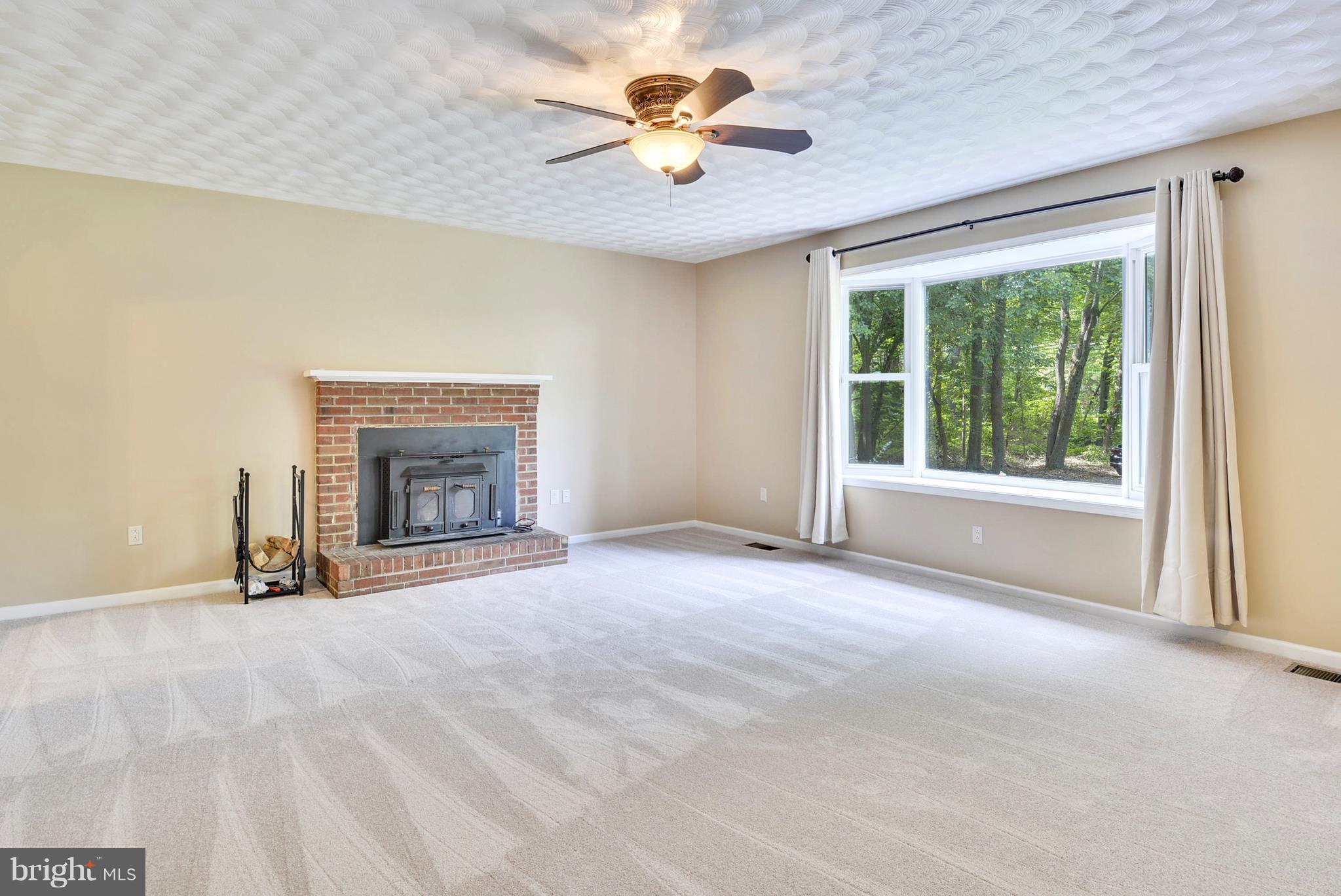7301 Token Valley Road Manassas, VA 20112 - Photo 8 of 29 Living Room w/ Brick Wood Burning Fireplace