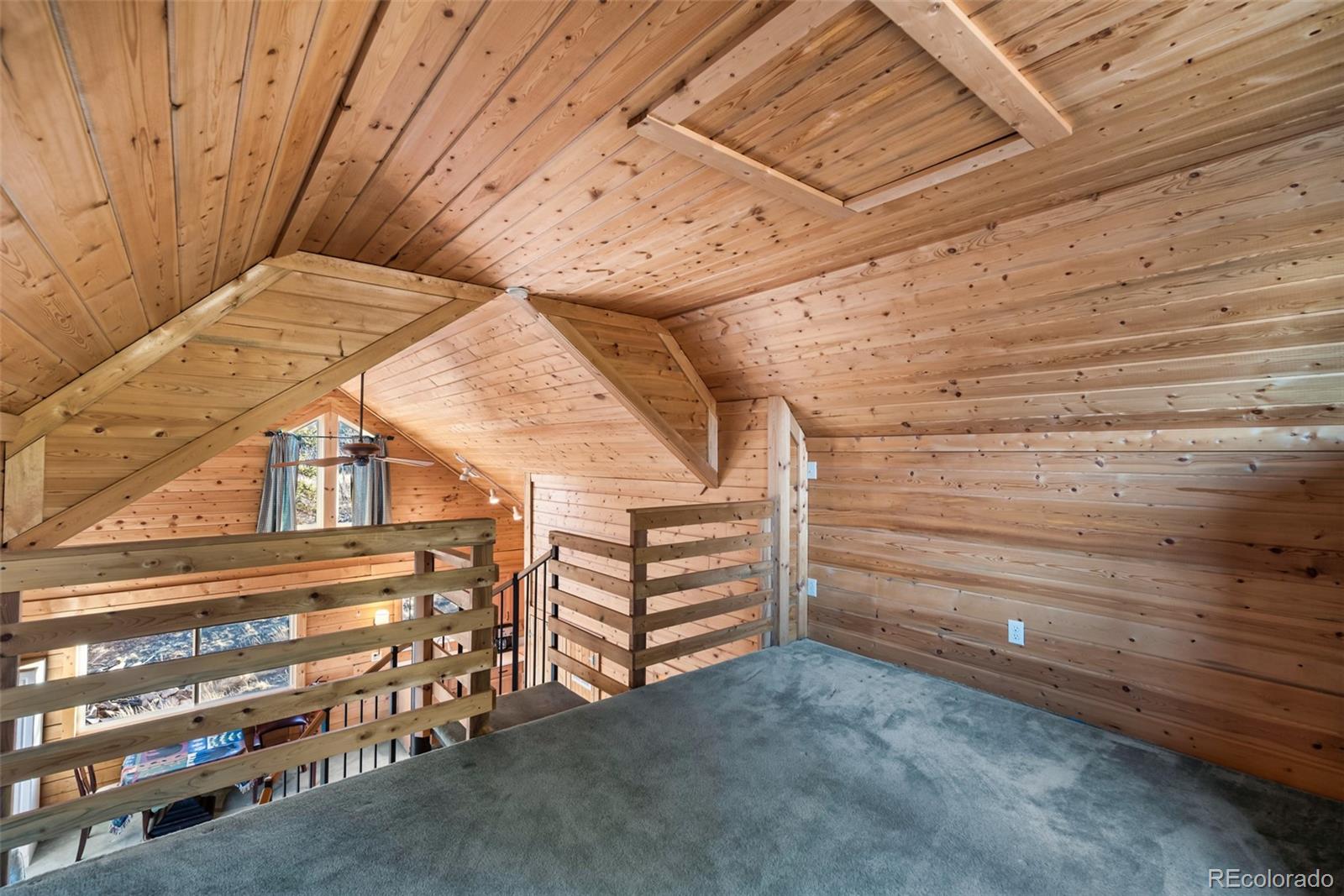 753 Teton Trail Como, CO 80456 - Photo 16 of 32 a view of a room with racks on the wall