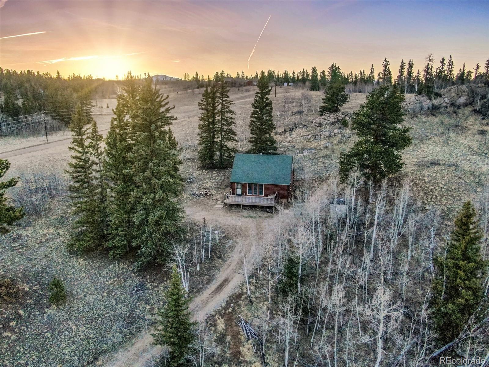 753 Teton Trail Como, CO 80456 - Photo 29 of 32 a view of a city with lush green forest