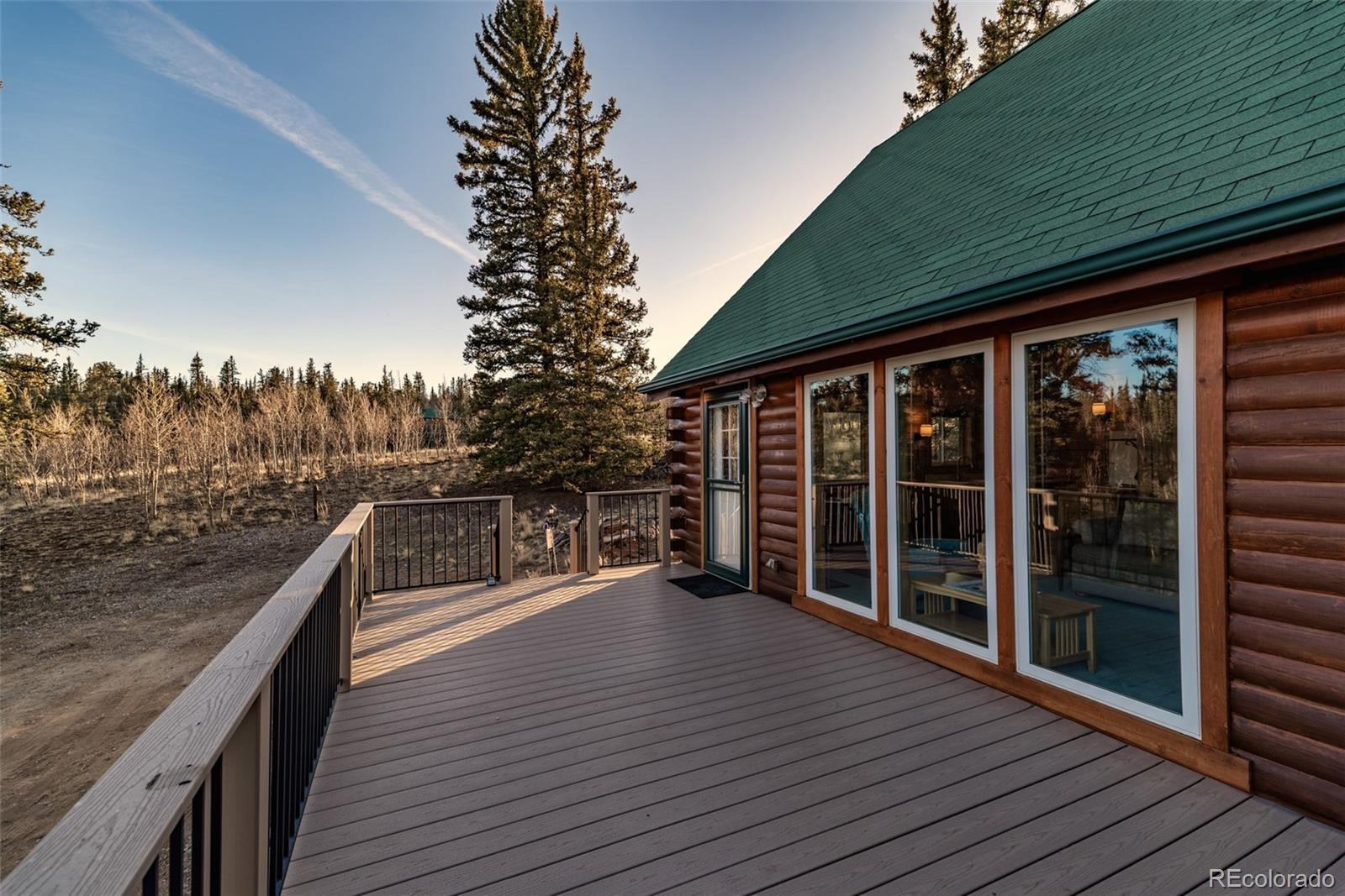 753 Teton Trail Como, CO 80456 - Photo 7 of 32 a view of deck with patio