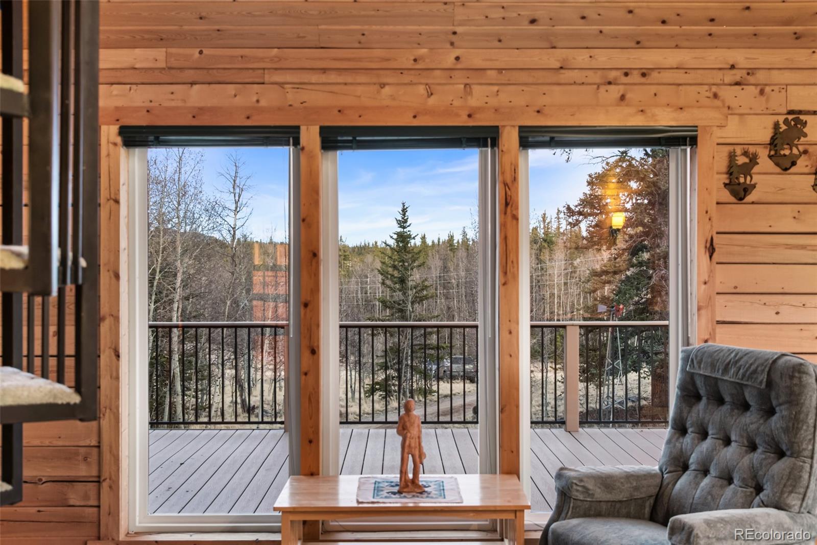 753 Teton Trail Como, CO 80456 - Photo 10 of 32 a view of a balcony with furniture