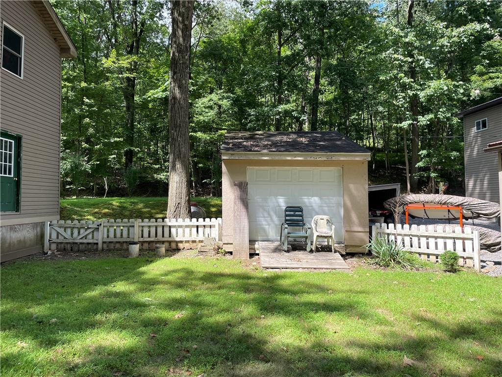 1850 Rockland Station Road Kennerdell, PA 16374 - Photo 11 of 36 a view of a house with backyard and a garden