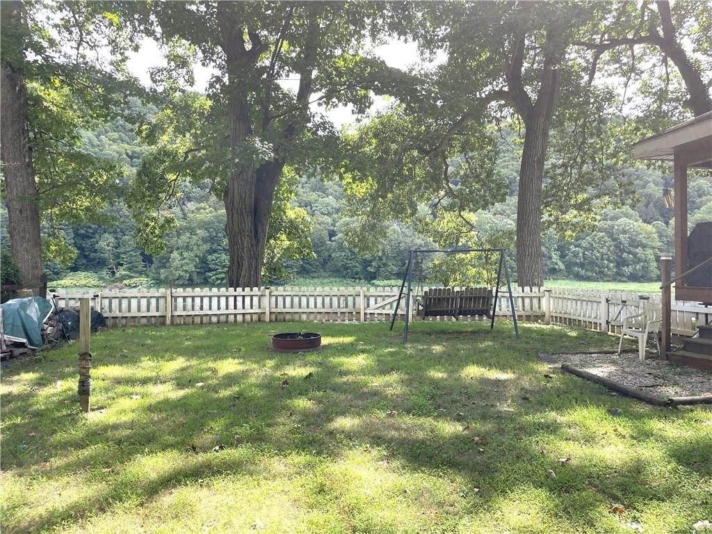 1850 Rockland Station Road Kennerdell, PA 16374 - Photo 13 of 36 a view of a deck with a big yard