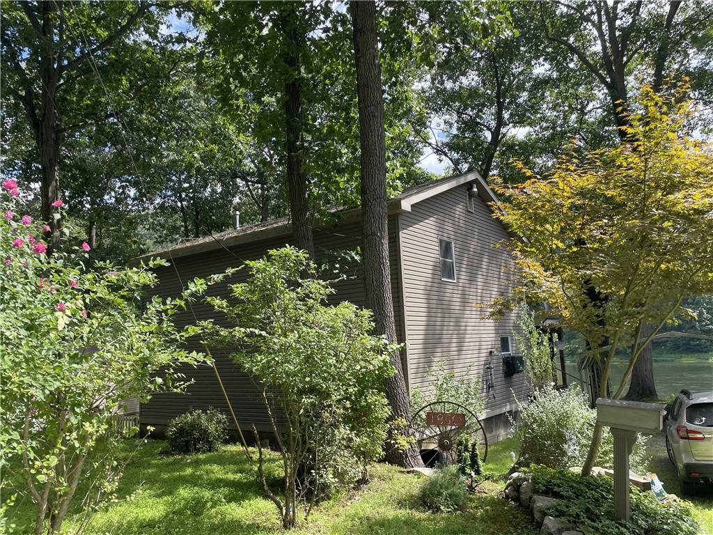 1850 Rockland Station Road Kennerdell, PA 16374 - Photo 4 of 36 a backyard of a house with lots of green space