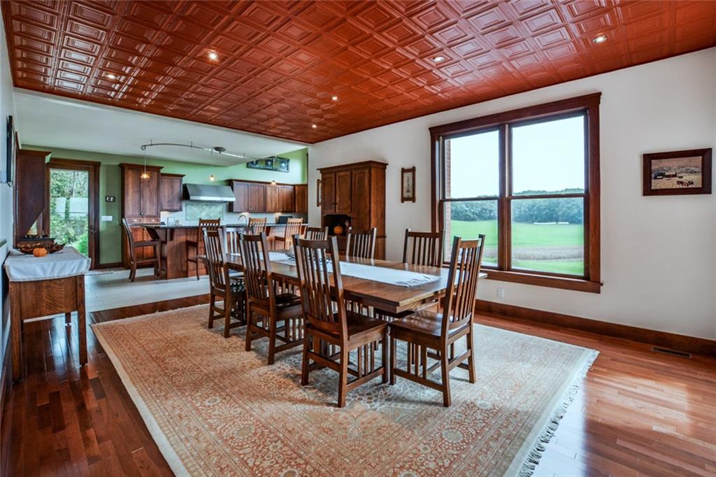 231 Anderson Road Butler, PA 16002 - Photo 4 of 25 Dining room with hard wood floors and tin ceiling