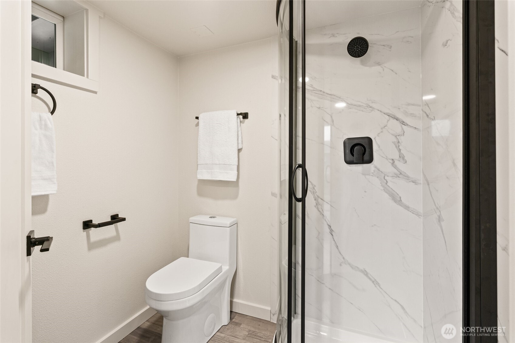 8129 224th Street Southwest Edmonds, WA 98026 - Photo 14 of 27 a bathroom with a sink toilet and shower