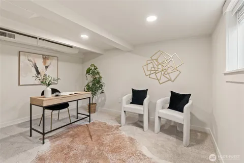 a view of a livingroom with furniture