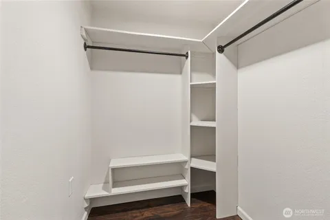 a bathroom with a vanity and a shower