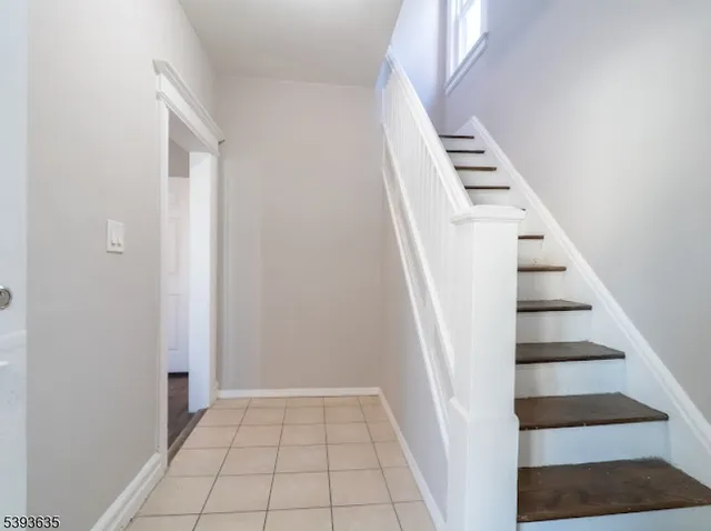 a view of an entryway with staircase