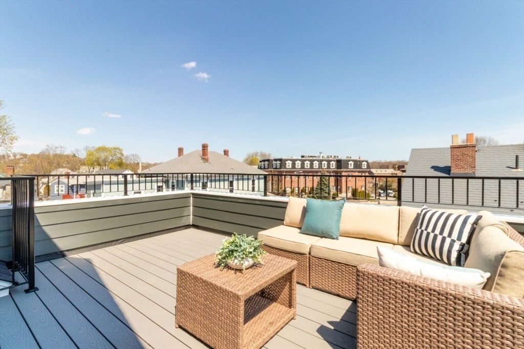 15 Tanglewood Road, Unit A Boston, MA 02126 - Photo 12 of 28 a view of a terrace with couches