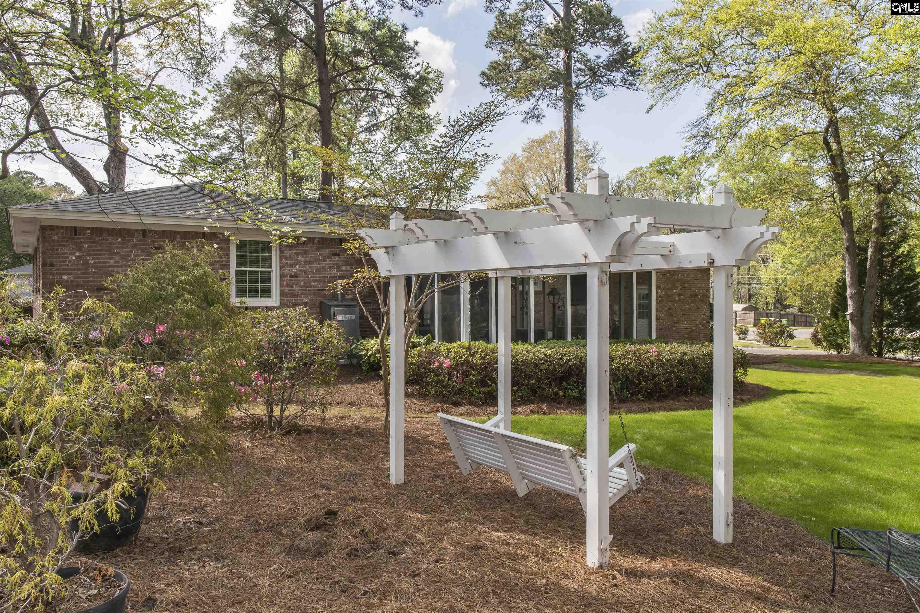 2309 Cunningham Road Columbia, SC 29210 - Photo 12 of 41 a view of a house with backyard and porch
