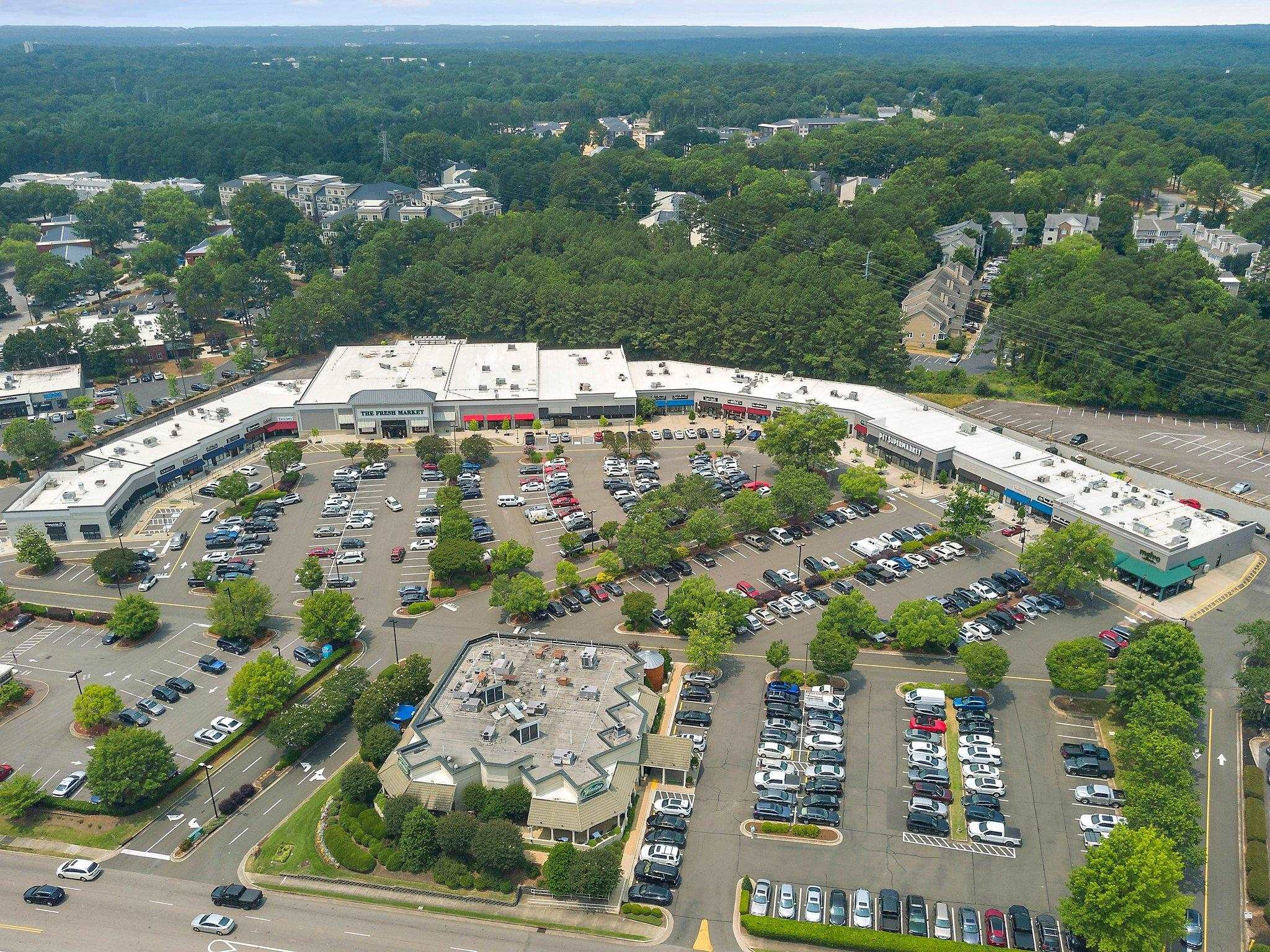 1512 Pony Run Road Raleigh, NC 27615 - Photo 37 of 39 Sutton Square and North Ridge Shopping Center are within Walking Distance -- Fresh Market, Winstons, Hallmark, Ace, Harris Teeter +++ All Sorts of Necessity and Fun Stores. Convenience at its BEST!!! Sutton Square Shopping Center
