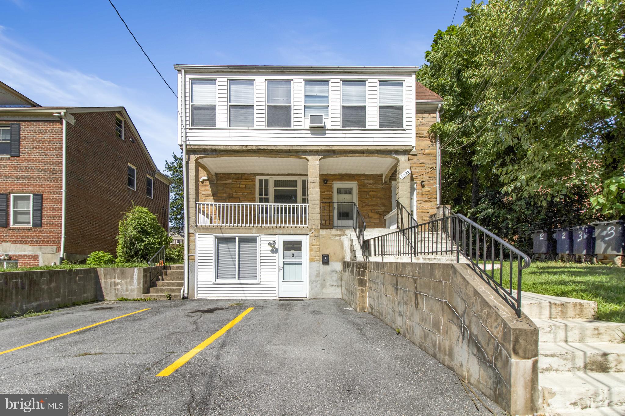 6120 41st Avenue, Unit 1 Hyattsville, MD 20782 - Photo 2 of 28 front view of a house with a yard