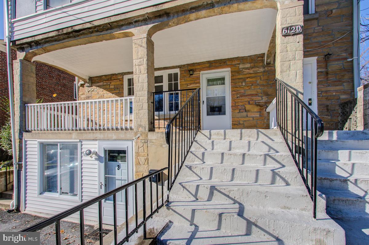 6120 41st Avenue, Unit 1 Hyattsville, MD 20782 - Photo 3 of 28 front view of a house with a balcony