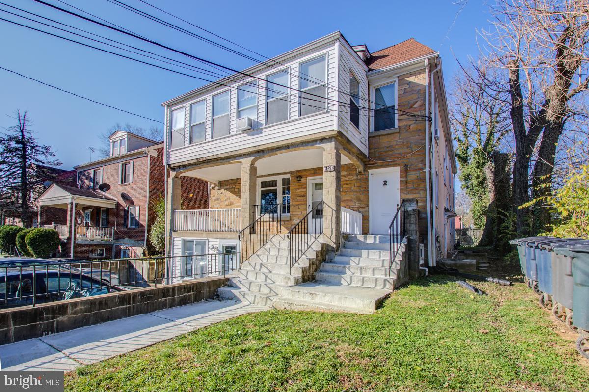 6120 41st Avenue, Unit 1 Hyattsville, MD 20782 - Photo 4 of 28 a front view of a house with garden