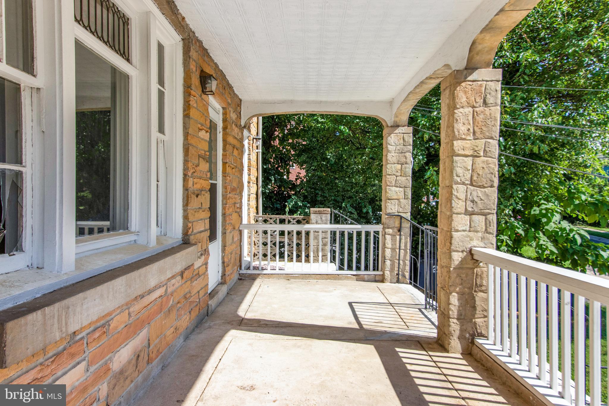 6120 41st Avenue, Unit 1 Hyattsville, MD 20782 - Photo 6 of 28 a view of a balcony with wooden floor