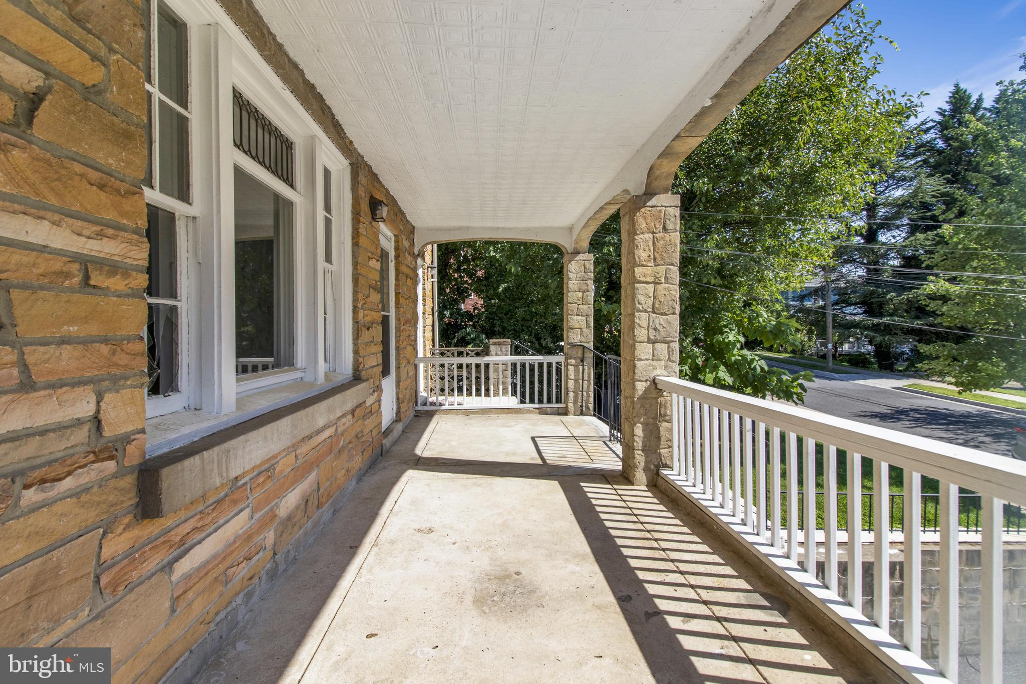 6120 41st Avenue, Unit 1 Hyattsville, MD 20782 - Photo 7 of 28 a view of a balcony with wooden floor