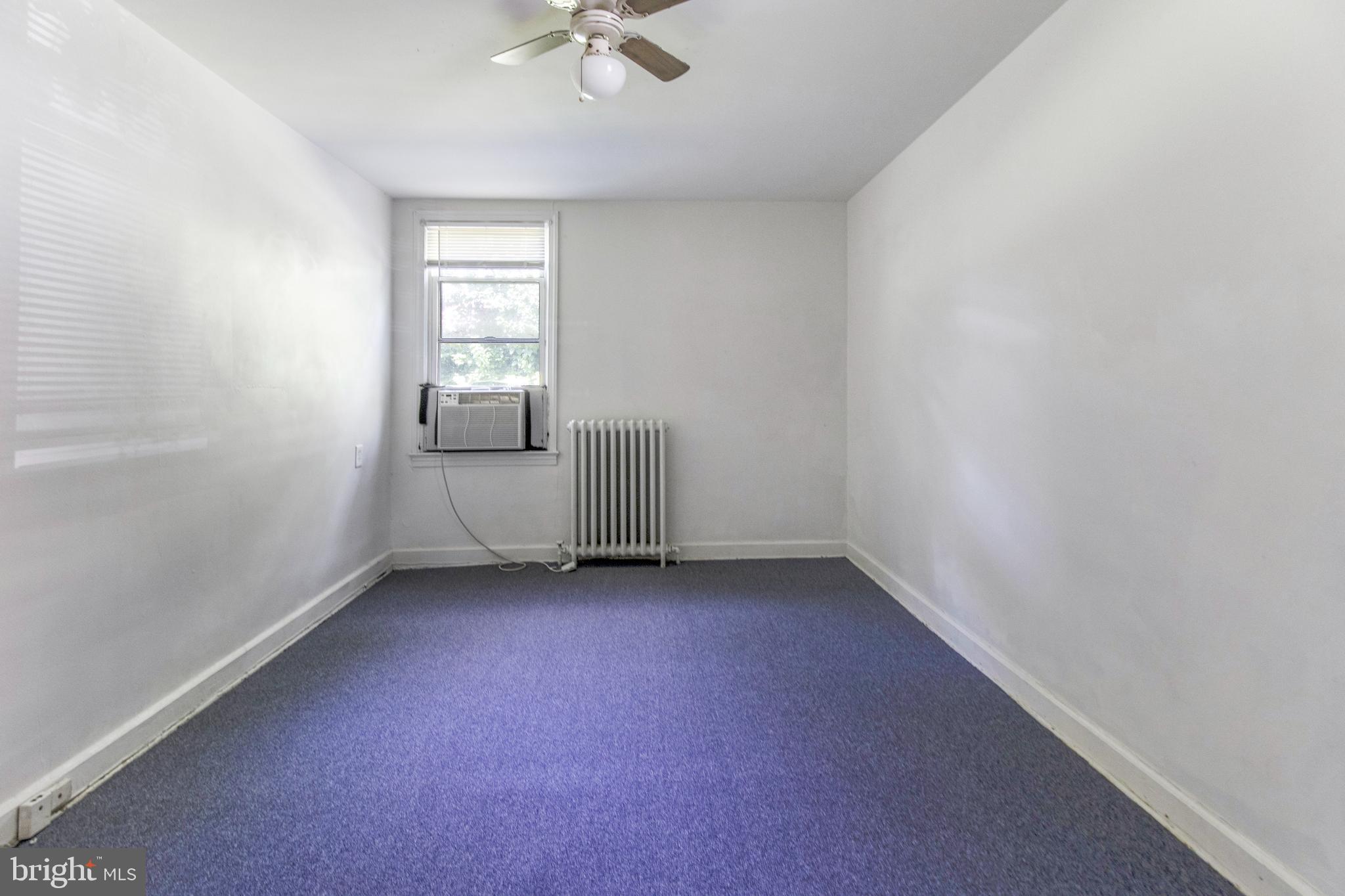 6120 41st Avenue, Unit 1 Hyattsville, MD 20782 - Photo 10 of 28 an empty room with a window
