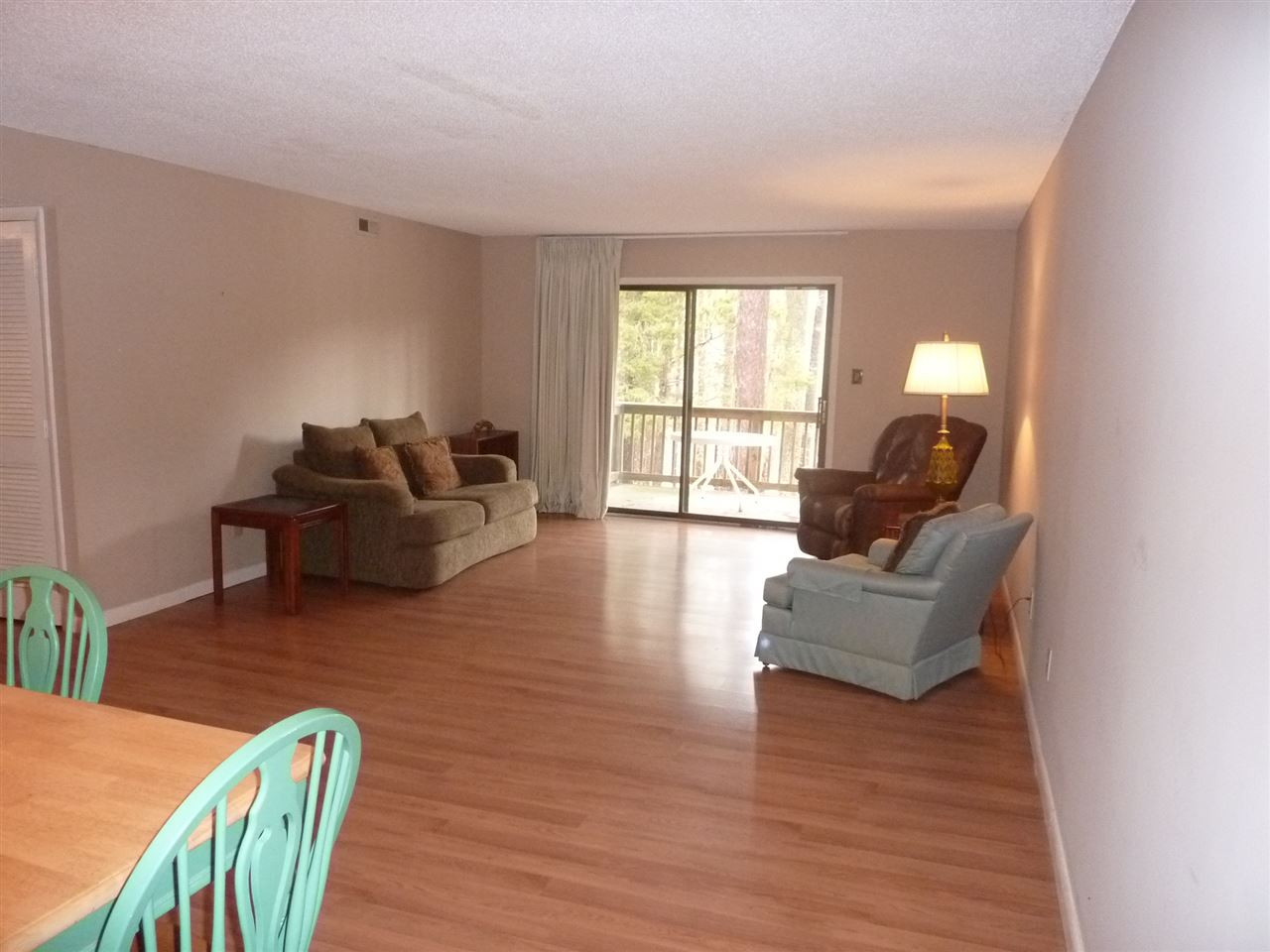 683 Pine Ridge Place, Unit 683 Raleigh, NC 27609 - Photo 1 of 12 Welcome Home! This room is spacious - ready for you to give it your personal touches! The sliding glass doors open onto a nice sized deck overlooking the pond. Living Room