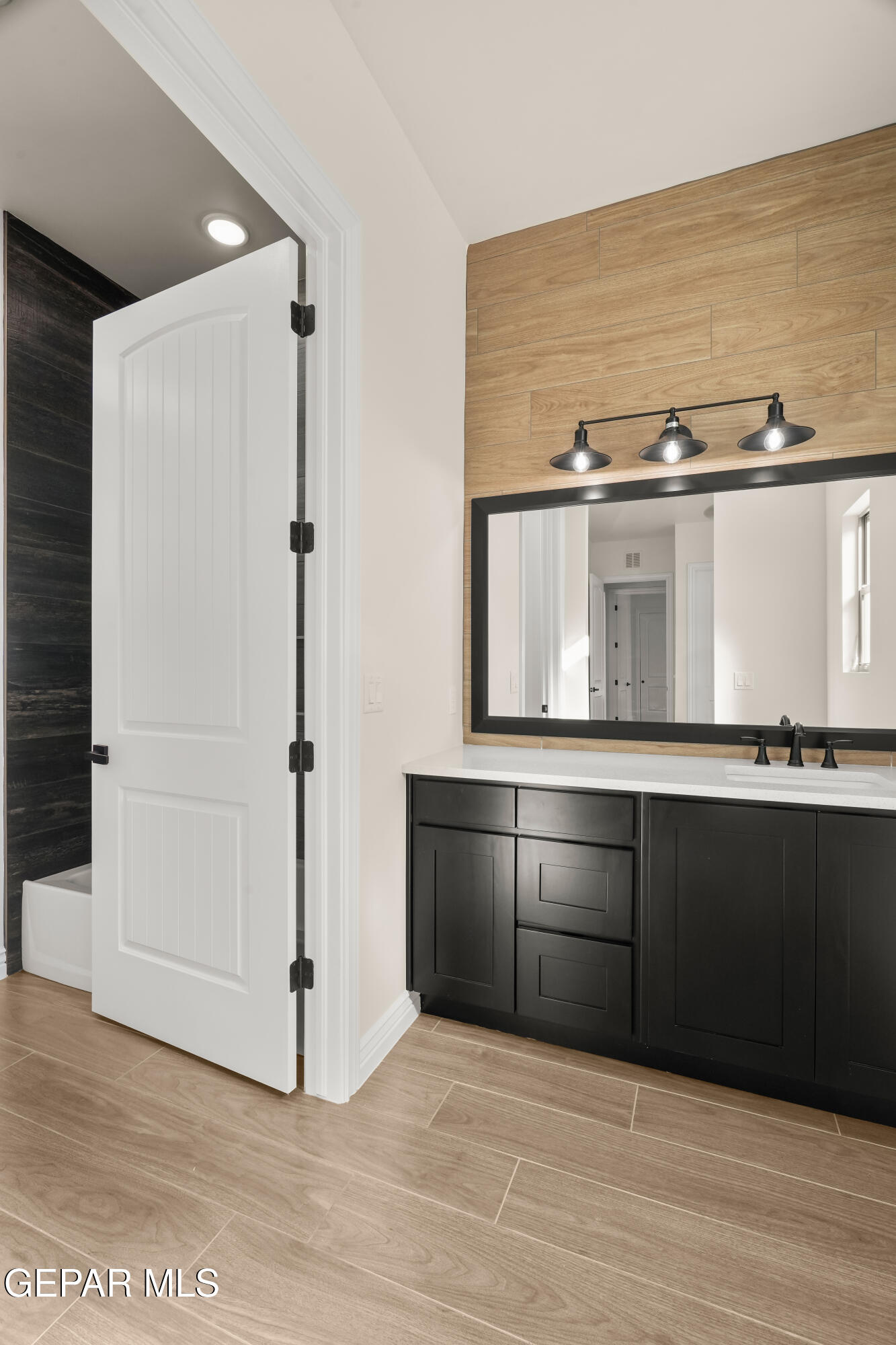 5646 River Run Street El Paso, TX 79932 - Photo 41 of 66 a view of a living room with a wooden floor