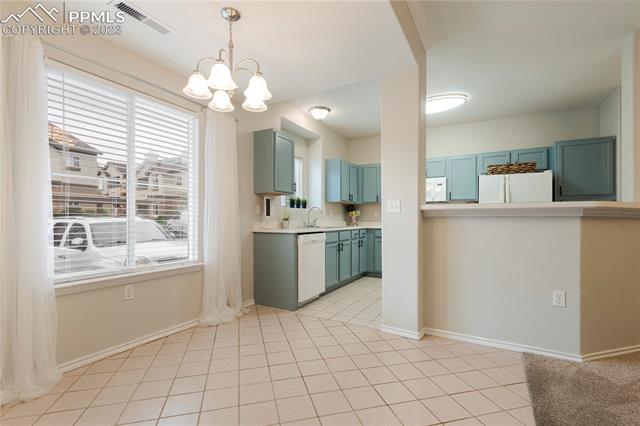 3780 Riviera Grove, Unit 101 Colorado Springs, CO 80922 - Photo 7 of 21 Dining Area adjoins the Kitchen