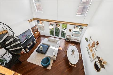 a room with furniture and a large window