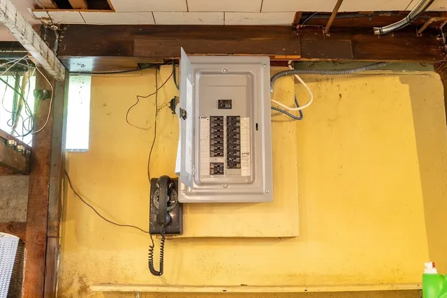 a front door view of a yellow house