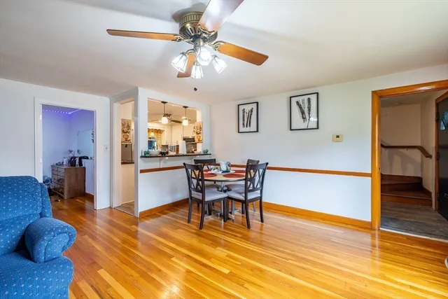 a workspace with furniture and wooden floor