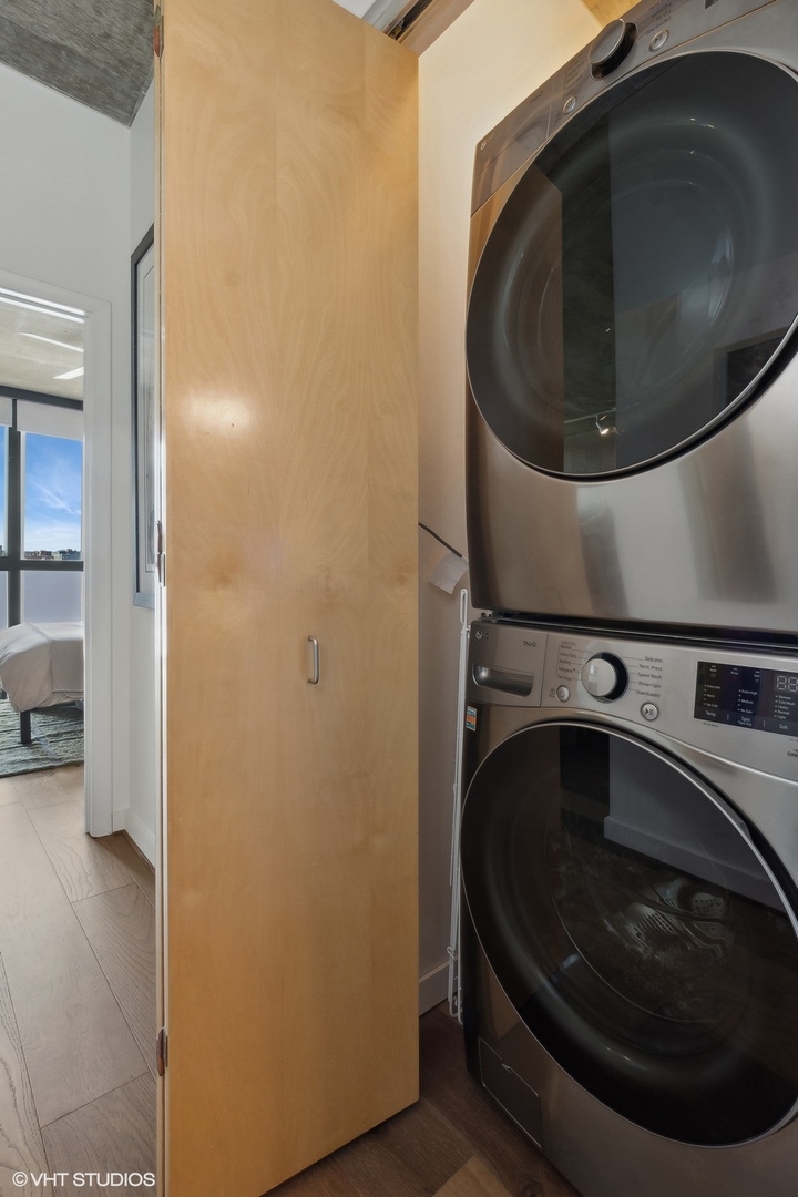 321 South Sangamon Street, Unit 502 Chicago, IL 60607 - Photo 12 of 19 a utility room with a washer and dryer