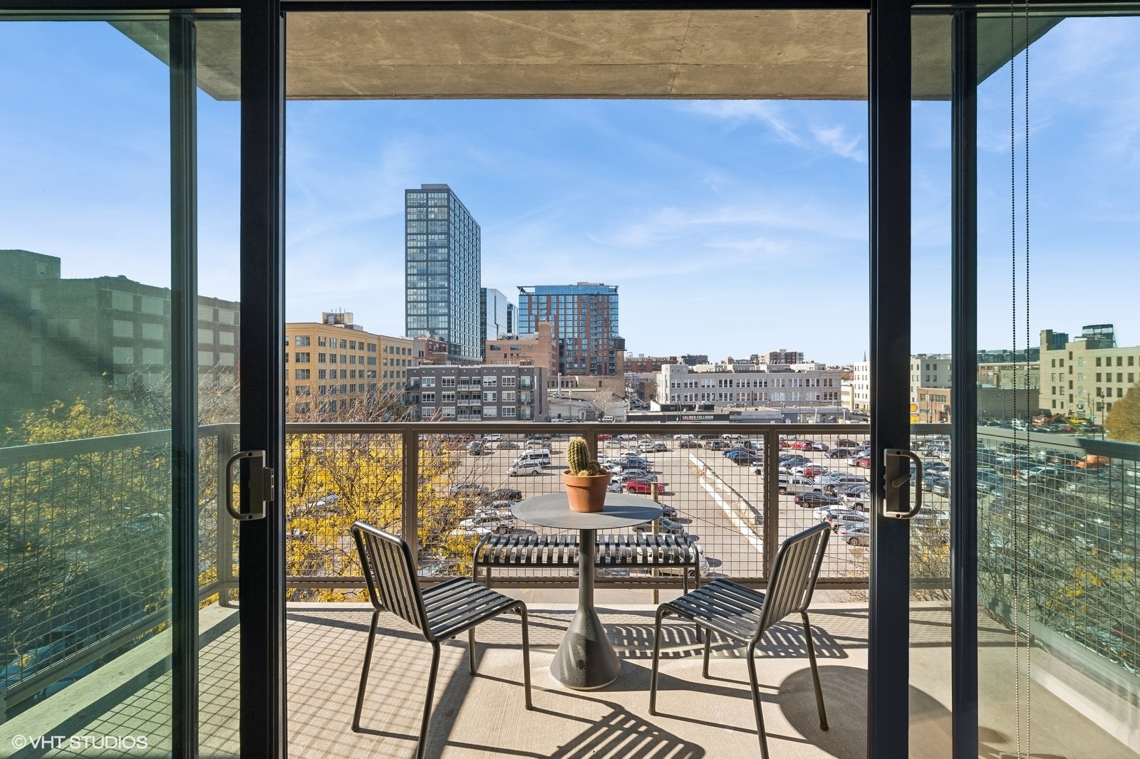 321 South Sangamon Street, Unit 502 Chicago, IL 60607 - Photo 18 of 19 a view of a chairs and table in the balcony