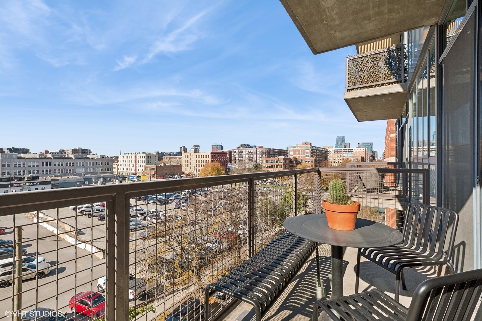 321 South Sangamon Street, Unit 502 Chicago, IL 60607 - Photo 19 of 19 a balcony with chairs and city view