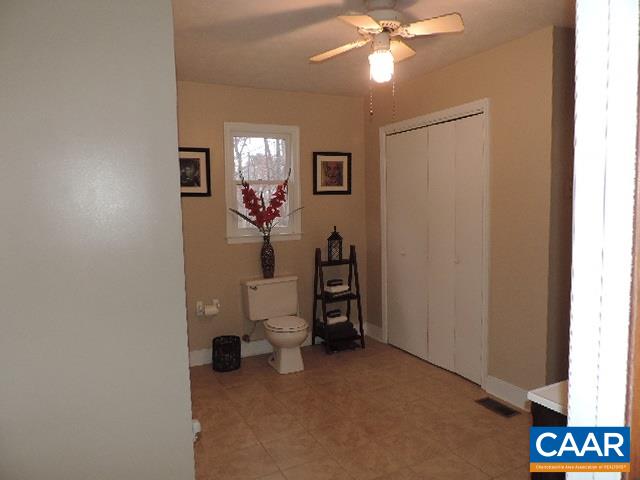 6451 Bell Road Dillwyn, VA 23936 - Photo 11 of 18 a view of a livingroom with furniture and chandelier fan