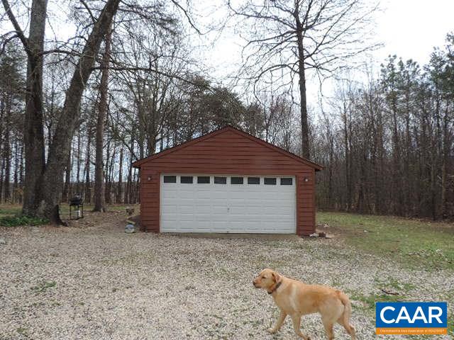6451 Bell Road Dillwyn, VA 23936 - Photo 15 of 18 a front view of a house with a yard and garage
