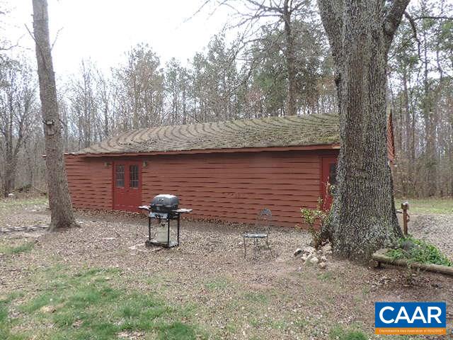 6451 Bell Road Dillwyn, VA 23936 - Photo 16 of 18 a backyard of a house with table and chairs
